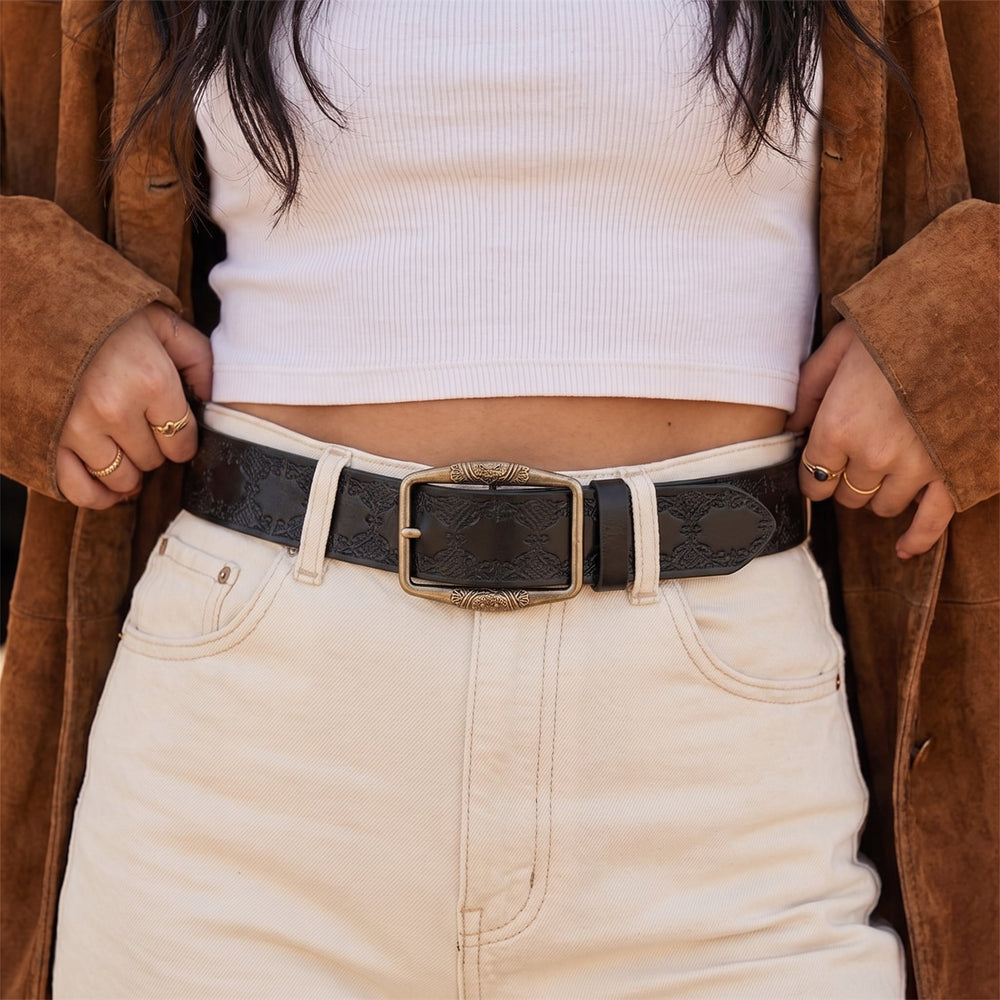 Woman wearing the Drayton Belt in black with cream jeans and a suede jacket