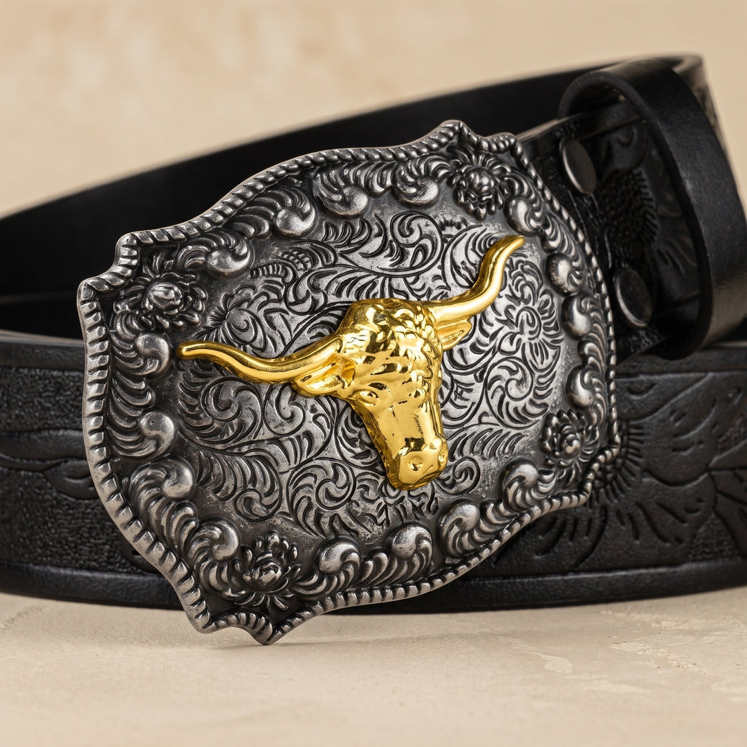 Close-up of the antique silver filigree buckle with a gold longhorn, black strap