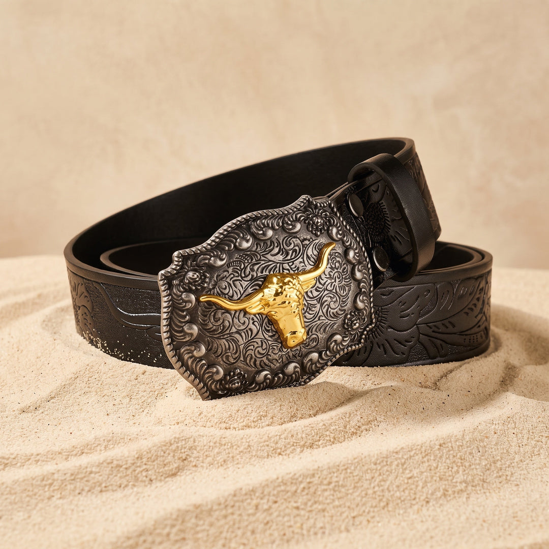 The Dutton Belt in midnight black, coiled on sand