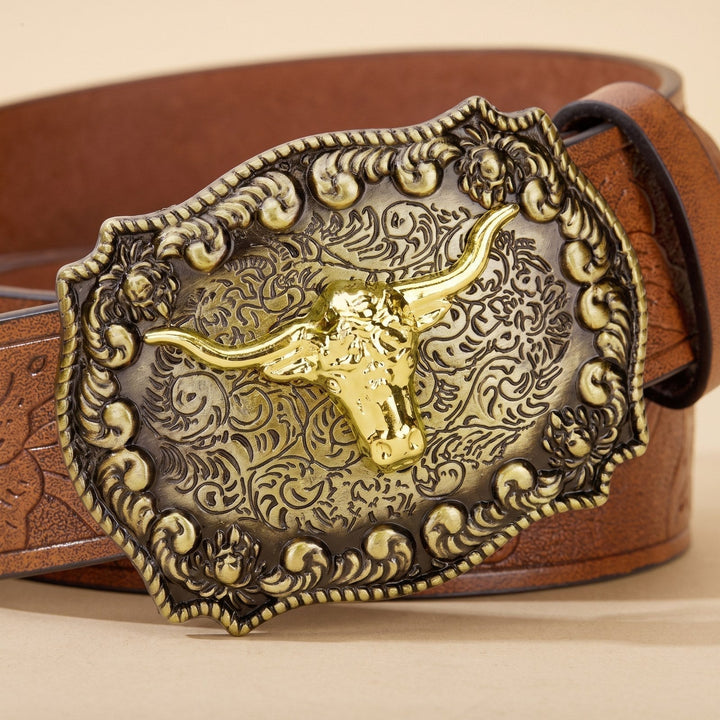 Detail of the gold longhorn and floral scrollwork on the Dutton Belt buckle