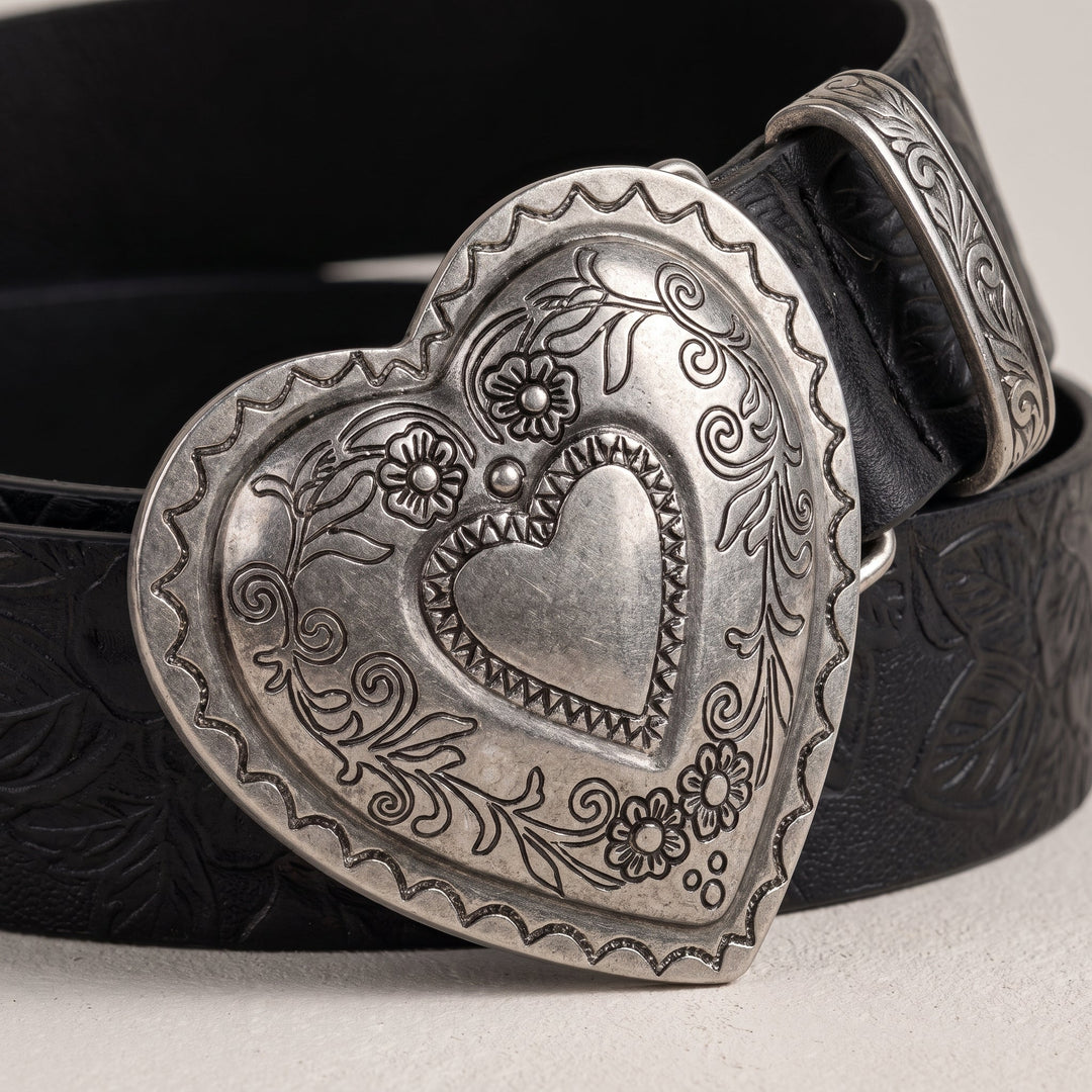 Close-up of the floral heart buckle on the Esdra Belt