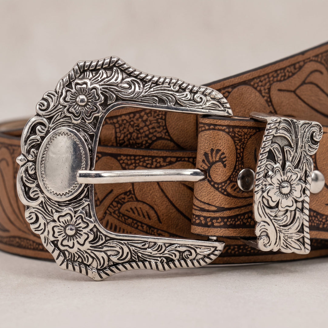 Close-up of the floral scrollwork buckle on the Nash Belt