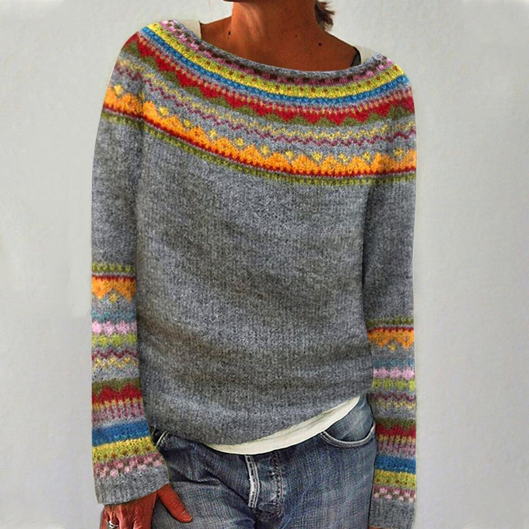 The Colter Sweater — grey knit sweater with multicolor patterned yoke, worn with jeans