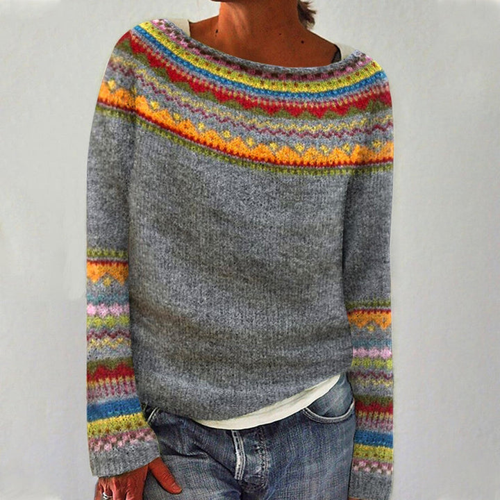 The Colter Sweater — grey knit sweater with multicolor patterned yoke, worn with jeans