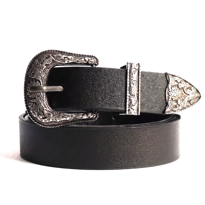 The Merle Belt in black with an engraved silver-tone buckle, keeper and tip