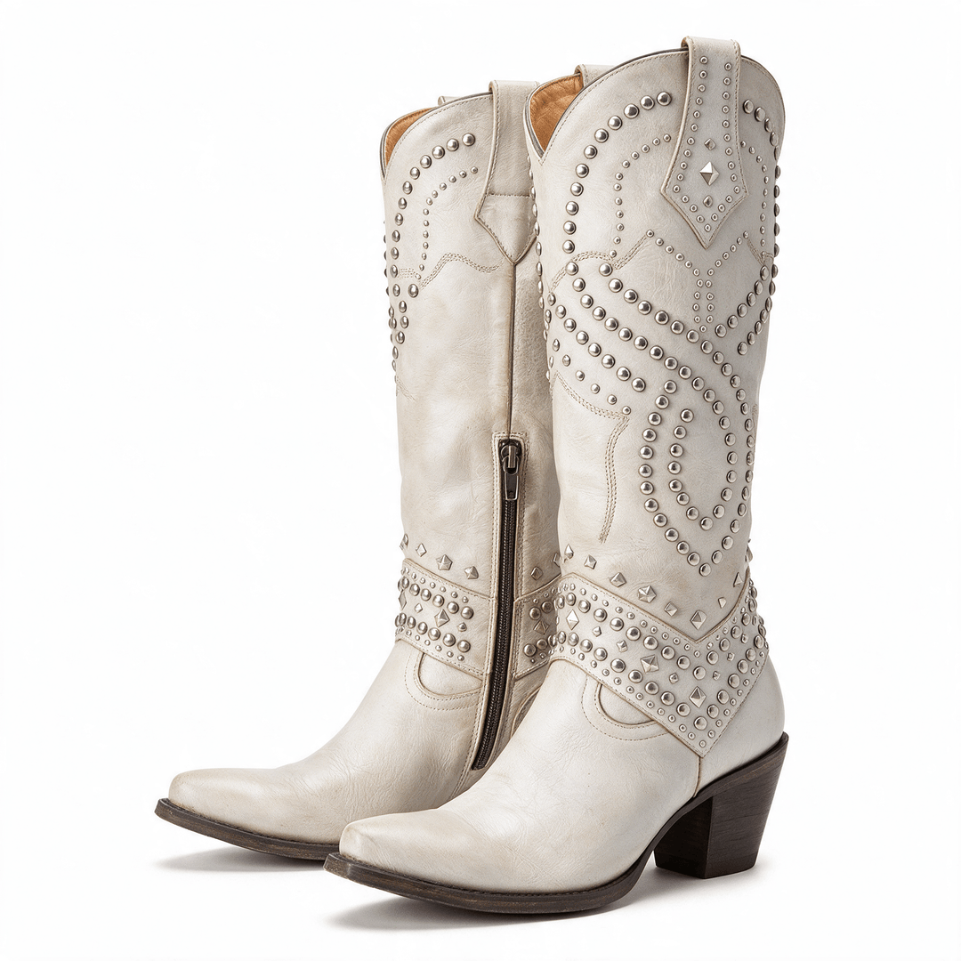 The Everly Boots in ivory — studded distressed leather western boot, studio product shot