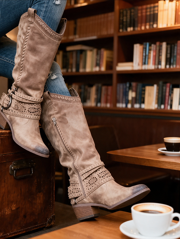 The Sloane Boots in taupe suede — tall cut-out harness boot styled in a cafe