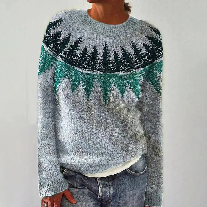The Reyes Sweater — pale blue knit sweater with evergreen treeline yoke