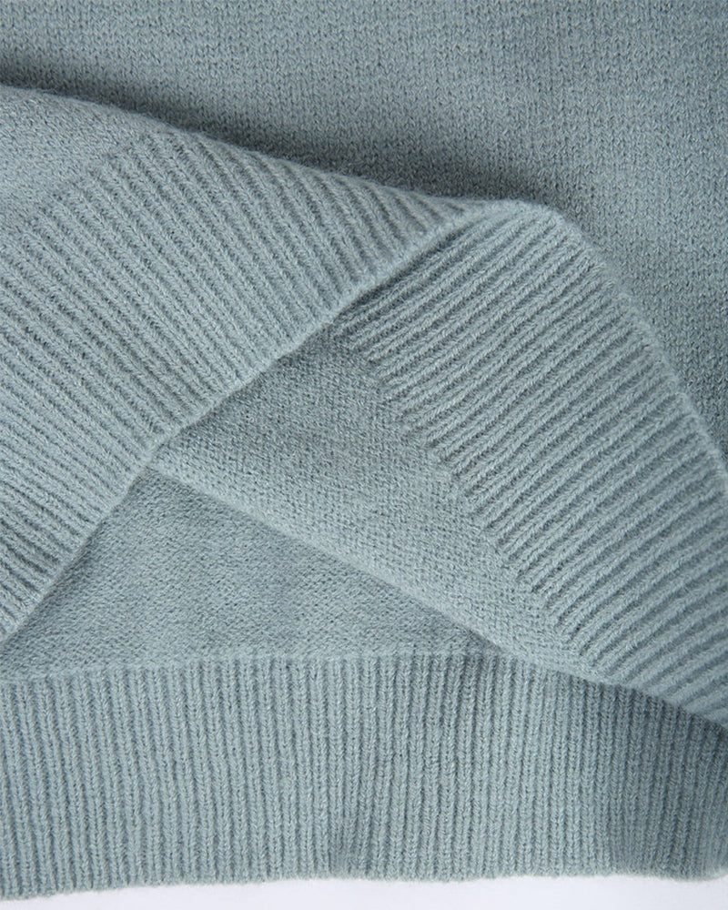 The Yuma Sweater — close-up of the soft fine knit and ribbed hem