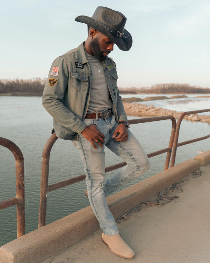 Westerline customer wearing a tooled western belt